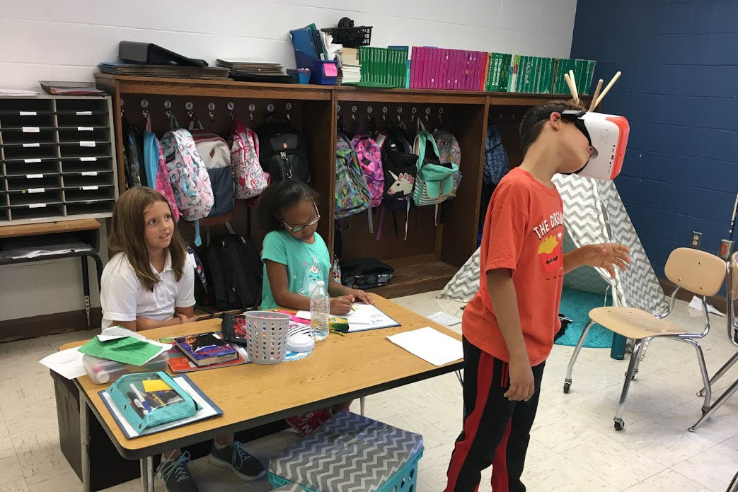 A pupil using an all-in-One VR headset